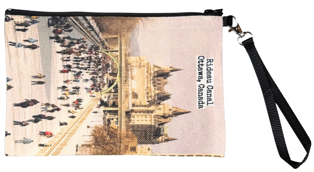 A pouch with a black strap. The image on the pouch is of the Rideau canal skateway and the Chateau Laurier in the background.