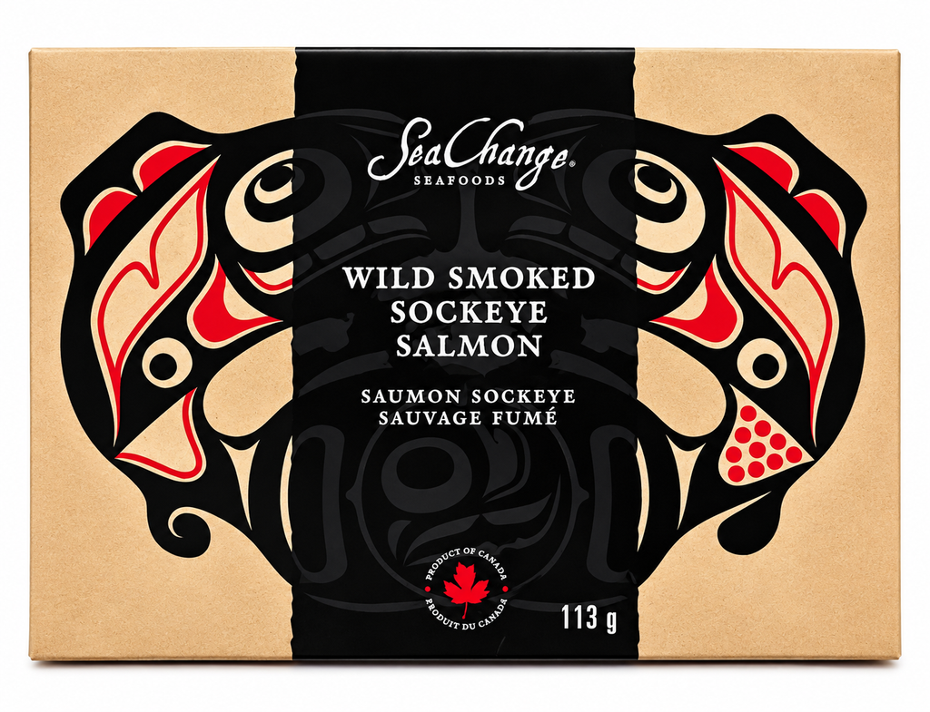 Picture features a single 113g smoked salmon travel pack. On the travel pack, Haida art of the Canadian pacific salmon by artist Don Yeomans is shown.