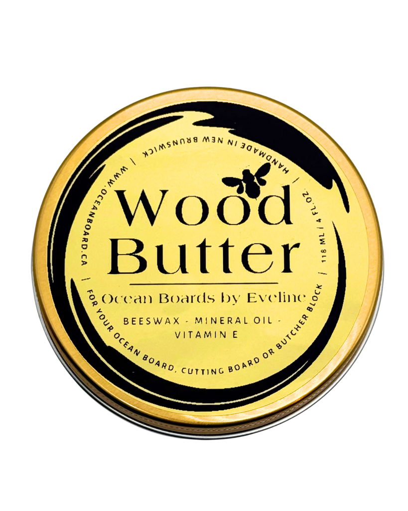 Shiny gold tin of wood butter with black detailing.