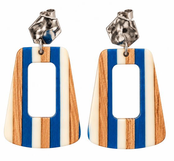 A pair of rectangular stud drop earrings with a cutout in the middle. Has a striped pattern of white, blue, and walnut wood. Hardware is silver.