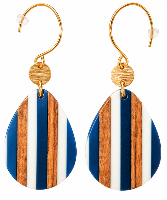 A pair of teardrop hook earrings with a striped white, blue, and walnut wood pattern. Hardware is gold.