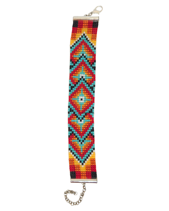 Bright and colourful seed bead bracelet with red, orange, yellow, and turquoise dominating. Adjustable length chain and lobster clasp.