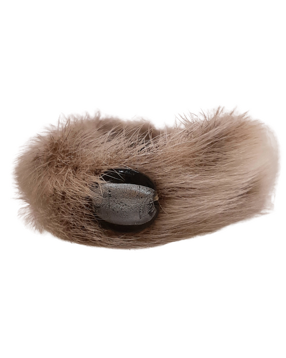 Women's bracelet made of grey sealskin fur and leather with large bead accent at top.