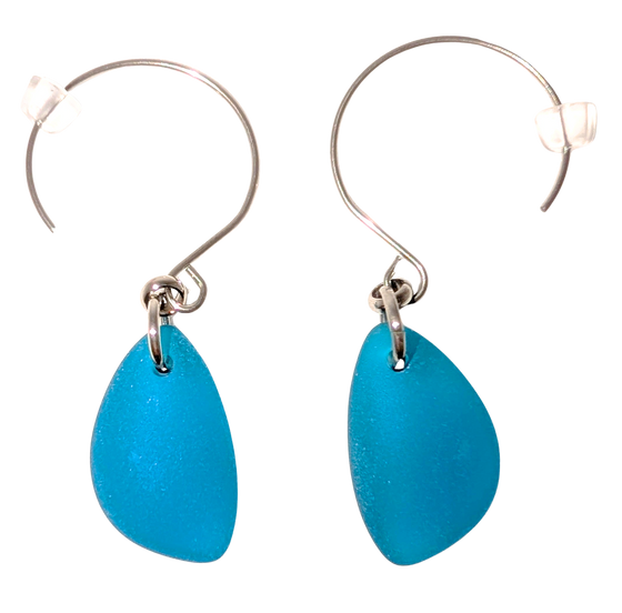 Blue teardrop sea glass earrings with silver hooks.