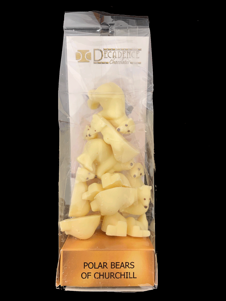 White chocolate shaped as polar bears. In plastic wrapping with cardboard backing that says "Polar Bears Of Churchill."