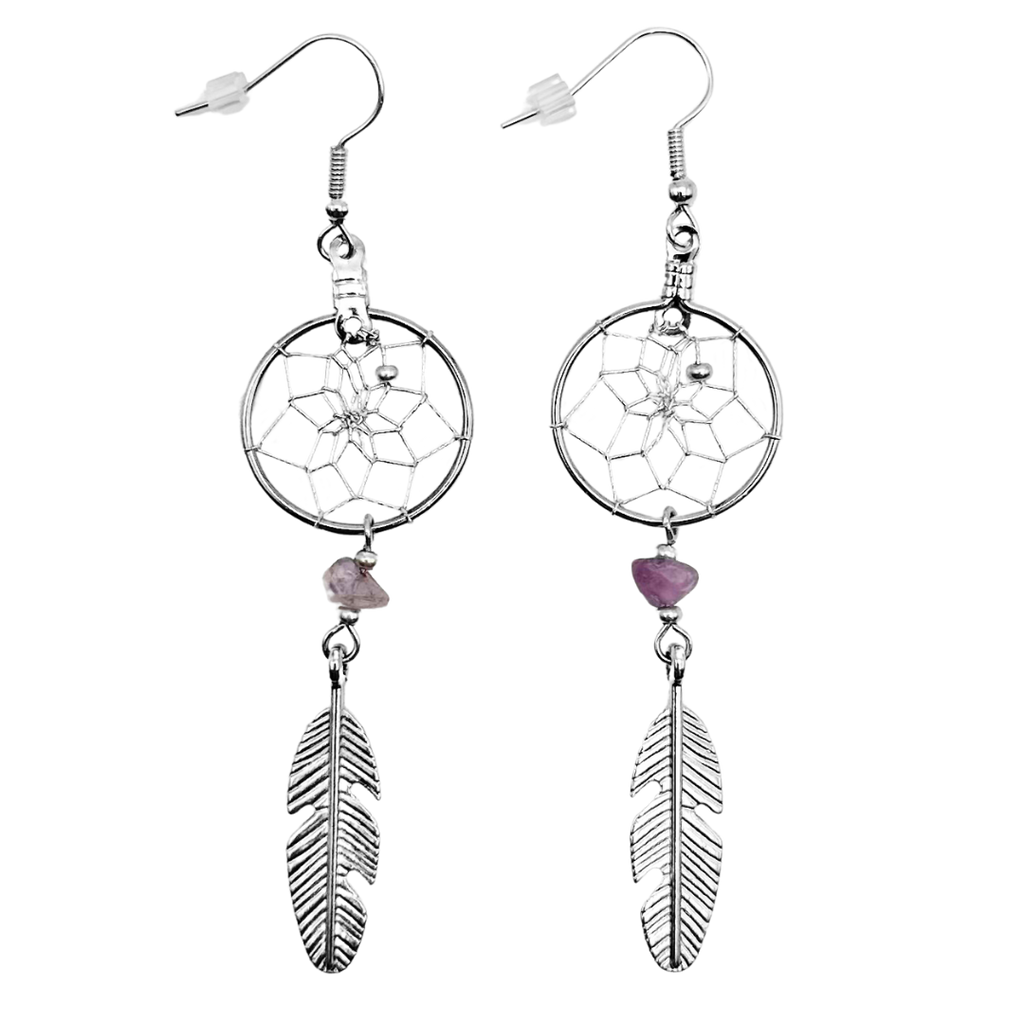A pair of silver dream catcher earrings with amethyst stones handing, and a silver feather hanging from the stone.