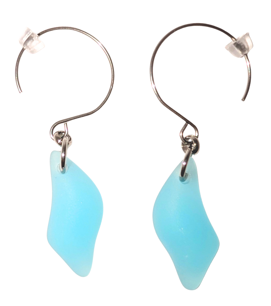 Turquoise diamond-shaped sea glass earrings with silver hooks.