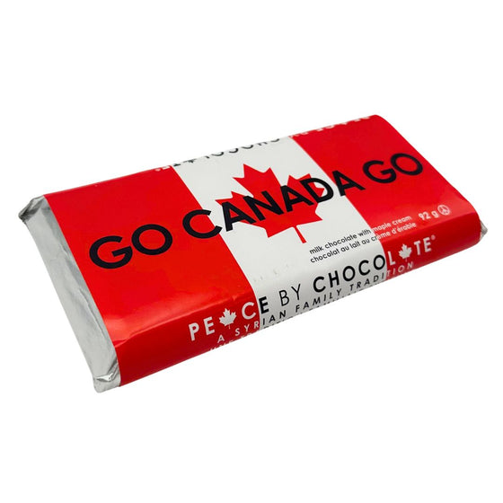 Silver foil wrapped chocolate bar. In a sleeve with a Canadian flag background with black lettering that says "Go Canada Go."