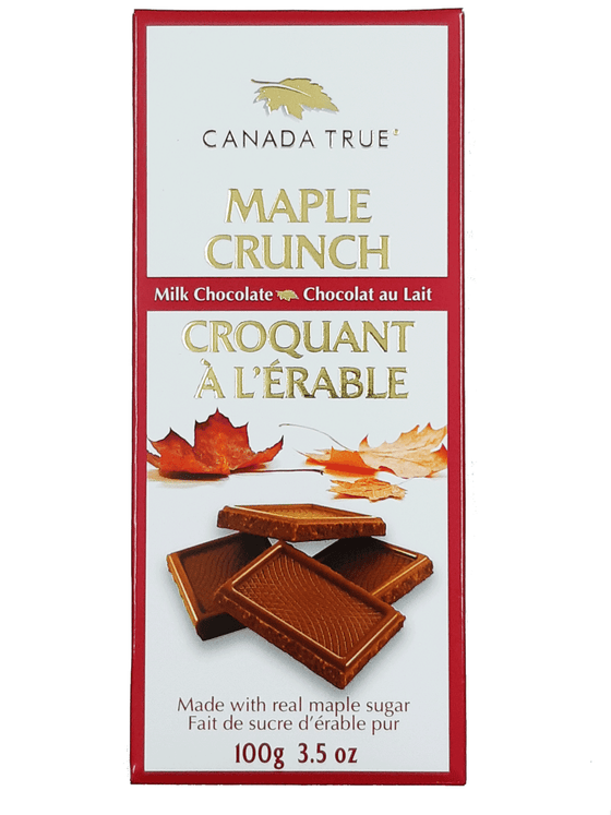 White box with a red outline. Product name is in center of box, embossed, and in gold. Image of the chocolate and fallen maple leaves.