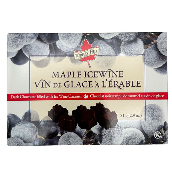 White box with images of icewine grapes as the border. Image of maple leaf chocolates with a white filling.