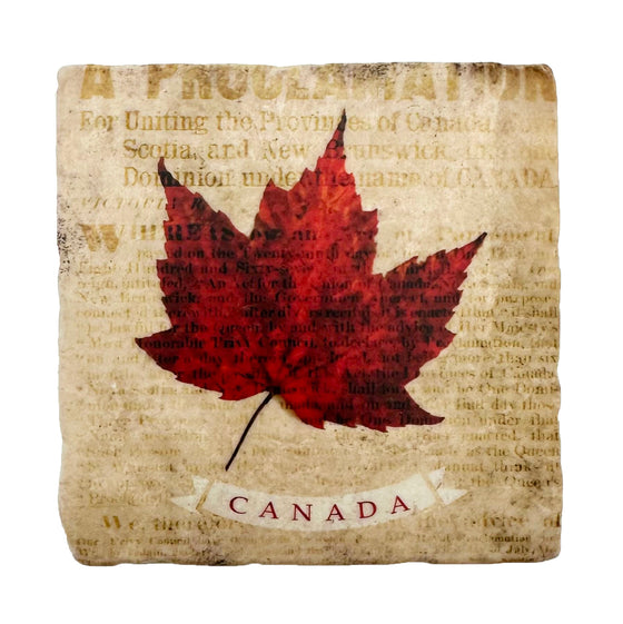 A red maple leaf is printed over a weathered image of the proclamation of the Constitution Act of 1867. Below the maple leaf, the word CANADA is framed by a white banner.