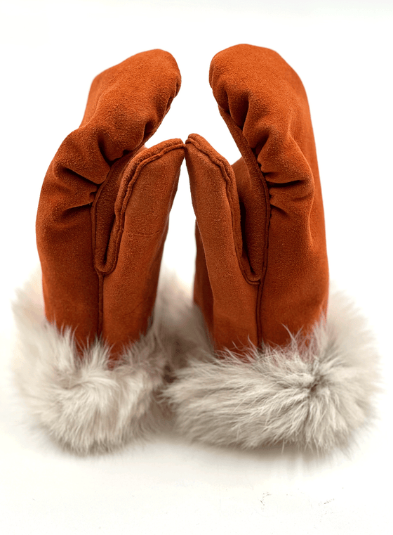 Burnt orange sealskin mittens. The outside of the mittens have sealskin fur and the palms of the mittens are a sealskin leather material.