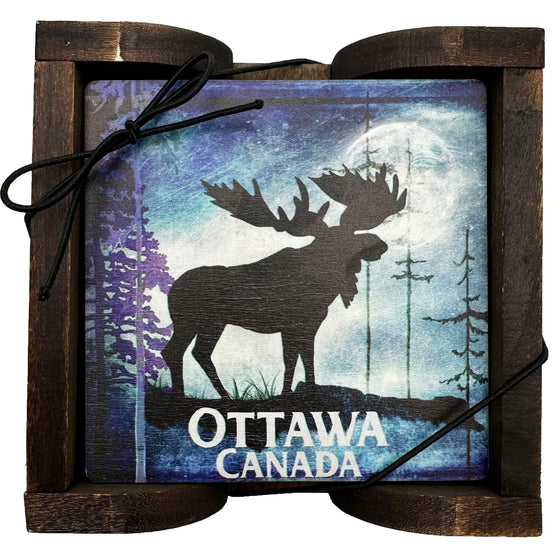 Set of 4 Ottawa Moose Coasters with a black moose against a blue winter landscape and "Ottawa, Canada" written on the bottom. Also comes with a wooden holder.
