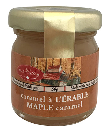Clear jar with caramel coloured maple caramel inside.