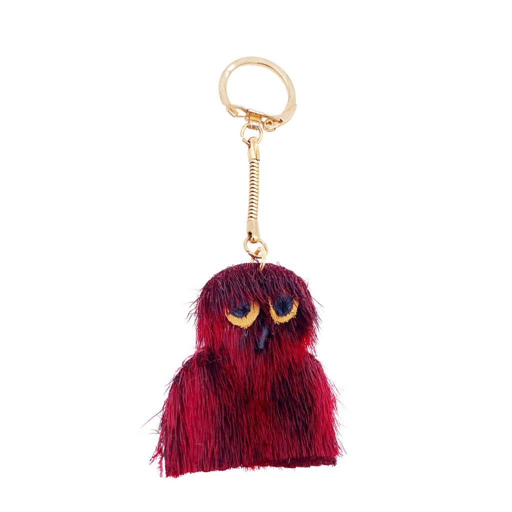 red sealskin ook pik owl key ring with gold hardware.