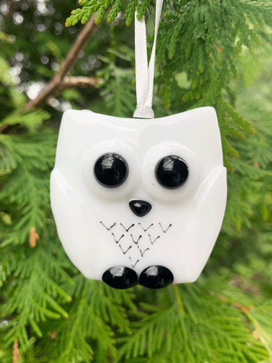 This adorable owl ornament is Canadian made from fused glass. The owl is mostly white with black eyes, nose, feet, and feathers.