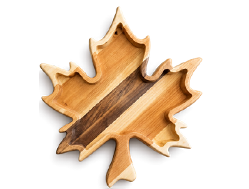 Maple leaf-shaped wooden serving tray with natural wood grain, made in Ontario, Canada