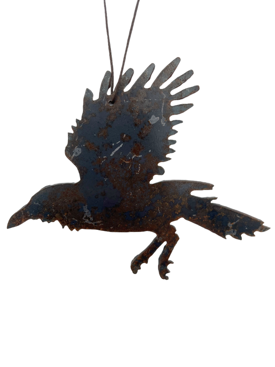 A flying crow, cut from sheet steel and oxidised to a tasteful and unique rust pattern.