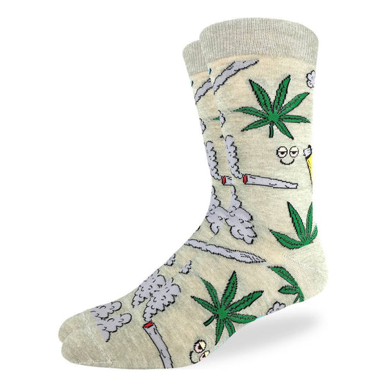 These socks are sure to hit right and mellow you out... Marijuana leaves, lit joints, smoke, dazed smiley faces and lighters embellish these socks, all over a pastel yellow background. Perfect for a night with some "buds". 85% Cotton, 10% Polyester, 5% Spandex