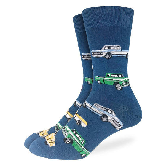 These fun socks feature blue, green, and yellow pick-up trucks on a dark blue background. Spandex added to the 85% cotton blend gives the socks the perfect amount of stretch to hug your feet.