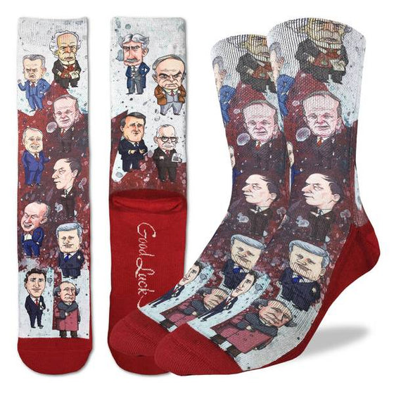 These fun socks feature caricatures of some of the most well known prime ministers such as Brian Mulroney, Jean Chrétien, John A. Macdonald, John Diefenbaker, Justin Trudeau, Lester Pearson, Louis St. Laurent, Paul Martin Jr., Pierre Trudeau, Sir Robert Borden, Stephen Harper, Wilfrid Laurier, and William Lyon Mackenzie King. The sole, toe, and heel of the socks are red. The active fit socks sport elastic arch bands to contour to your feet and provide support. 