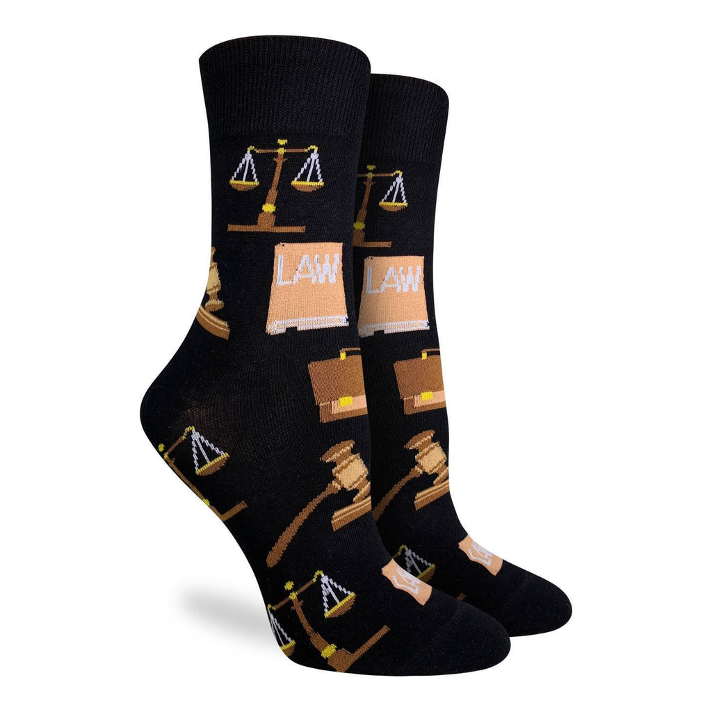 Get ready to serve up sweet justice wearing these black socks, adorned with courtroom icons such as the scales of justice, a briefcase, a law book and a gavel. 85% Cotton, 10% Polyester, 5% Spandex