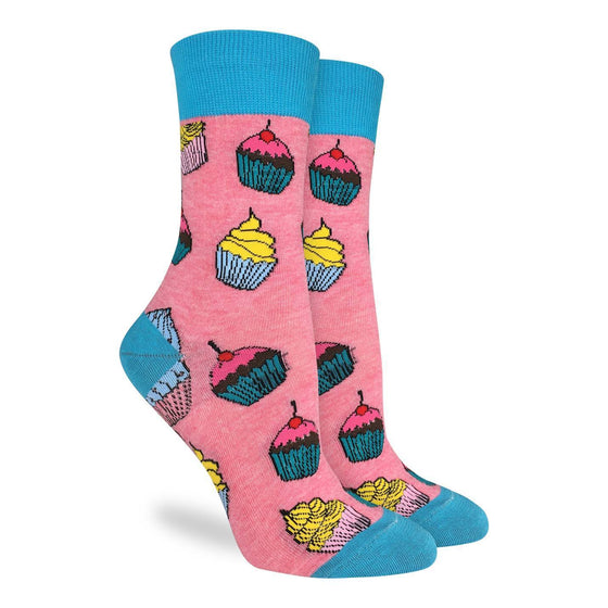 These delightful socks feature several cupcakes of different styles. They are light pink with blue toes, heels and cuffs. Perfect for the sweet-toothed confectioner in us all! 85% Cotton, 10% Polyester, 5% Spandex