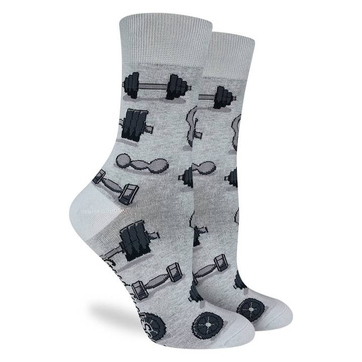 These fun socks feature dumbbells, kettlebells, and weight plates on bars, on a grey background with a lighter grey toe, heel, and rim. Spandex added to the 85% cotton blend gives the socks the perfect amount of stretch to hug your feet.