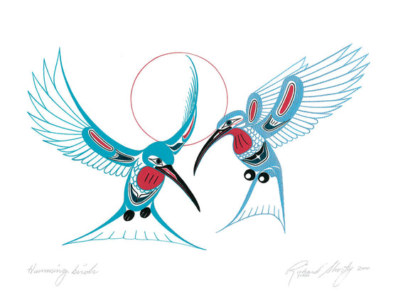 Two bright blue hummingbirds hover on a white background. They have black wings and feet. Blue u-shapes create individual feathers on their bodies and wings. Their throats are red, and they each have a red spot on their wings. A thin red circle halos the background behind the birds. This Canadian Indigenous print was painted by Richard Shorty. He is from the Yukon’s Northern Tuchone Tribe.