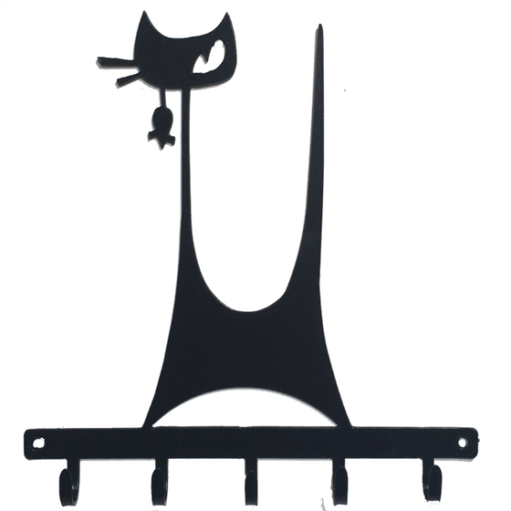 This metal sculpture shows the mate black silhouette of a highly stylized cat. It has a tall thin tail and large head on a tall thin neck. It has two whiskers and a single, cunning right eye.  A small mouse dangles from the cat’s mouth. The cat stands on a metal strip from which five hooks emerge. The metal strip has two holes punched through it, allowing the piece to be nailed or screwed into a wall.