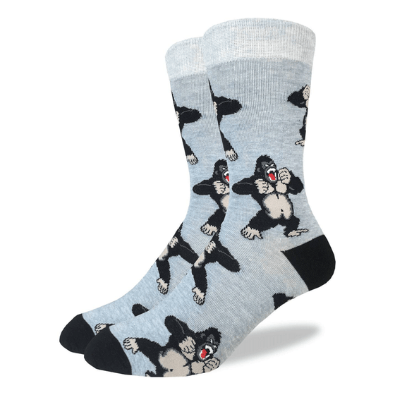These fun socks feature images of cartoon gorillas yelling and beating their chests with their fists. The background of these socks is a light grey, while the heel and toe are black and the rim a lighter grey. Spandex added to the 85% cotton blend gives the socks the perfect amount of stretch to hug your feet.