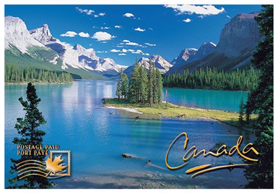 Image of Moraine lake. Lake with trees and mountains surrounding it. Text in bottom corners that say "Canada" and "paid postage".