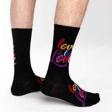 Show your pride and support with these progressive socks, they are black with rainbow coloured "Love is love" script on both the top of the foot and the leg. Great for spreading love and positivity everywhere you go!