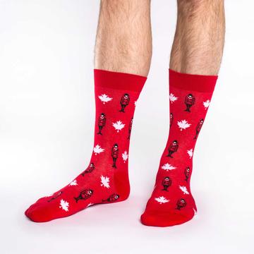 These fun socks feature white maple leaves and Canadian Mounties in uniform over a base of bright red. Spandex added to the 85% cotton blend gives the socks the perfect amount of stretch to hug your feet.