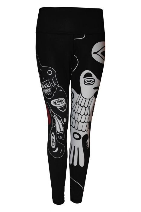 These black, white and red leggings are decorated with a raven motif. The raven’s wings are spread out and downward, and its head is turned to the right. It is enclosed by a larger, unknown creature. At the right of the larger creature is a small salmon. A large version of this motif with a white raven is printed on the left leg, and a small version with a red raven is printed on the right. 