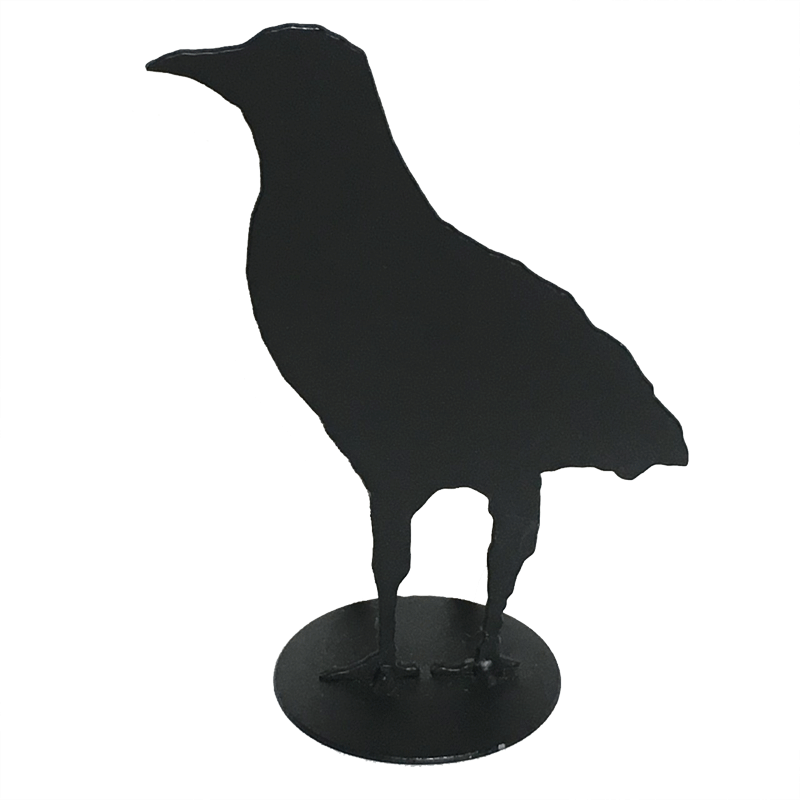 A close up of crow design G. This crow stands very tall, looking out at something distant. The silhouette implies that this crow is standing facing the viewer.
