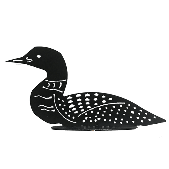 This metal sculpture shows the matte black silhouette of a loon. The metal has been delicately punched through to form the beak, collar and signature dappled spots of this bird. It sits on an oval base.