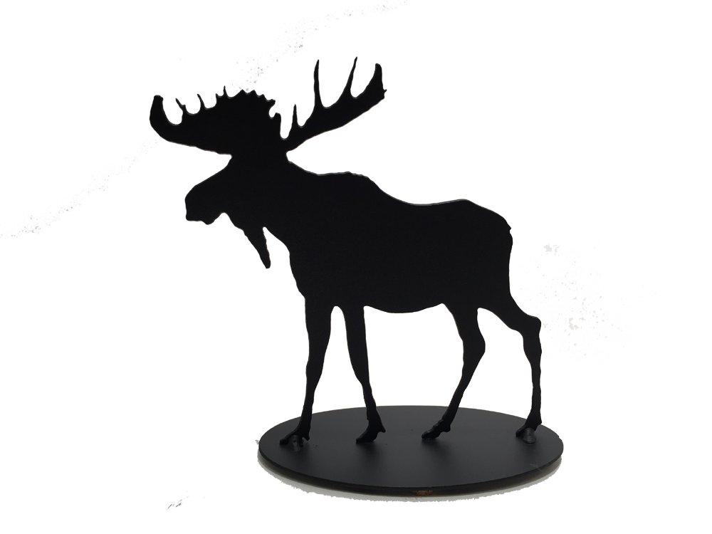 This metal sculpture shows the matte black silhouette of a moose. It has a full rack of antlers and a pronounced dewlap. Its strong shoulders contrast with its slender legs. Careful detailing along the edges give this piece a strong sense of realism. It stands on an oval base.