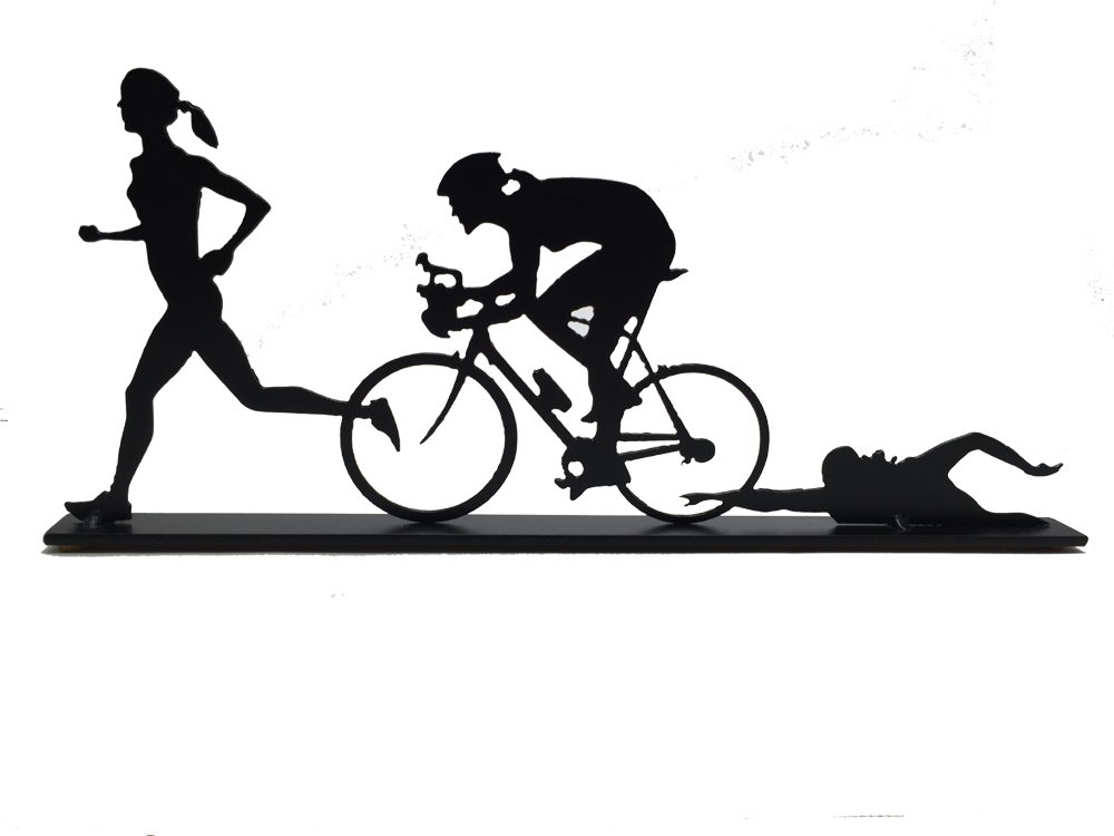 This metal sculpture shows the matte black silhouette of three female figures, each doing one trial in a triathlon. The leftmost is running, the center is biking, and the rightmost is swimming. The silhouettes slightly overlap each other. This piece sits on a narrow rectangular base.