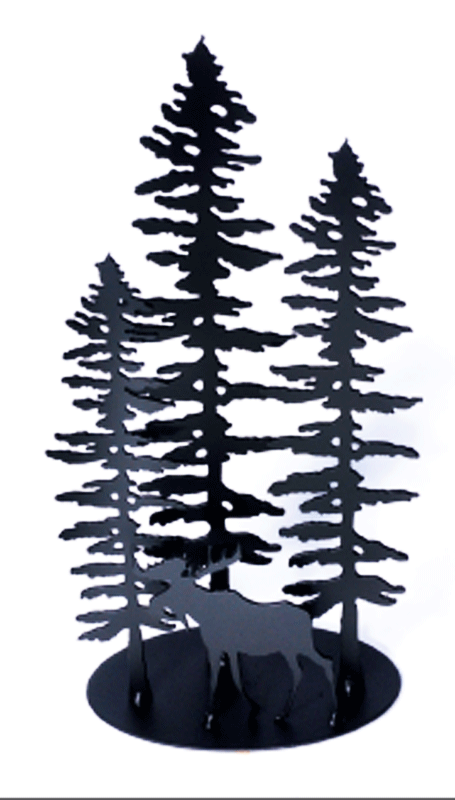 A metal sculpture showing the matte black silhouettes of three staggered Sitka pines and a moose. The moose stands in front of the trees, facing left. It has a full set of antlers and a pronounced dewlap. The trees are tall but slim. Their short, broad branches are about the same length along the whole tree, except at the top where they form a point. The sculpture sits on an oval base.