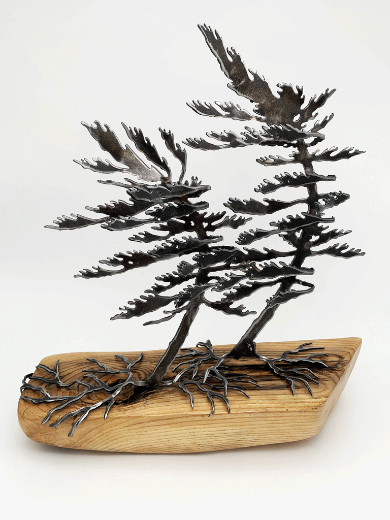 Steel windswept pine tree fitted onto a piece of Canadian tree wood.