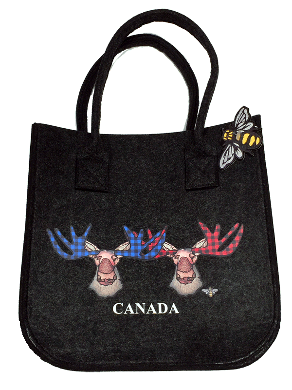 A medium charcoal tote bag with two moose side by side. One has antlers in blue plaid, the other in red plaid. The bag says CANADA on the bottom