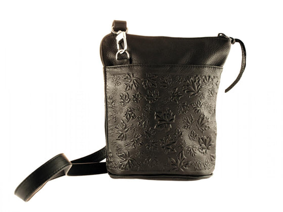 A black deerskin shoulder bag with maple leaves of varying sizes embossed on the outside. A shoulder strap clips to each end of the bag.