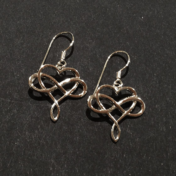Two hook earring featuring a sterling silver infinity symbol intertwined with a heart. The infinity symbol crosses the middle of the heart horizontally. The bottom of the heart twists to form a loop reminiscent of the infinity symbol.