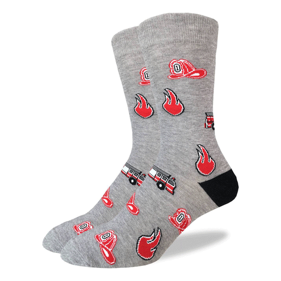 These fun socks feature cartoon images of a fire, a fireman's hat, and a fire truck on a background of light dappled grey with a black heel. Spandex added to the 85% cotton blend gives the socks the perfect amount of stretch to hug your feet.