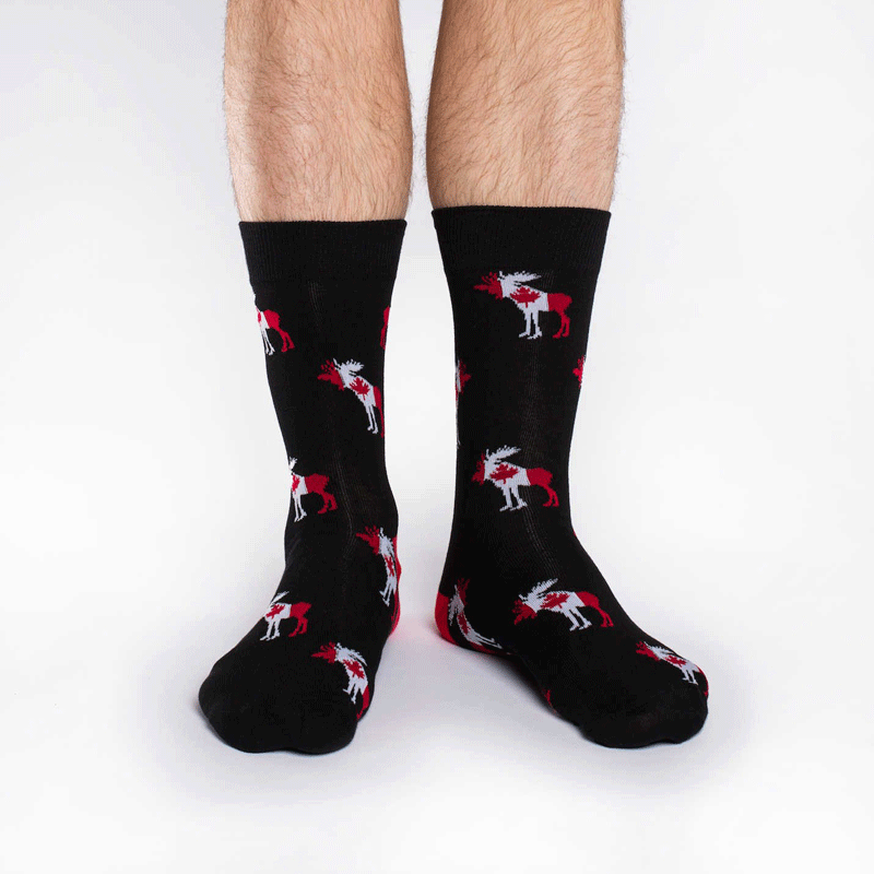These fun socks feature moose silhouettes filled with the canadian flag on a base of black with a red heel. Spandex added to the 85% cotton blend gives the socks the perfect amount of stretch to hug your feet.