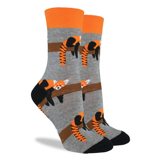 These fun socks feature some red pandas relaxing on a branch, on a background of grey with a black toe and heel, and an orange rim. Spandex added to the 85% cotton blend gives the socks the perfect amount of stretch to hug your feet.