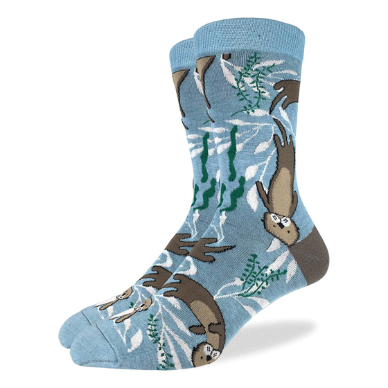 These fun socks feature some otters happily floating on the blue and white water background with sea weeds floating around them. The heel is the same brown as the otter’s fur. Spandex added to the 85% cotton blend gives the socks the perfect amount of stretch to hug your feet.