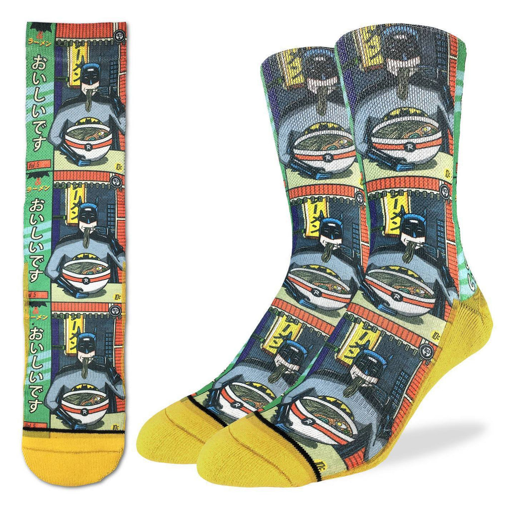 These fun socks feature a 1980’s comic book version of Batman sitting at a chinese noodle shop eating a bowl of ramen noodles. The image is printed three times, and the sole, toe, and heel of the socks are yellow. The active fit socks sport elastic arch bands to contour to your feet and provide support.