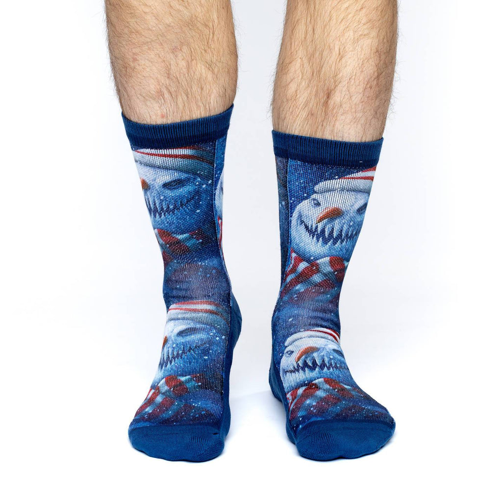 These fun socks feature the image of a snowman, with a hat, scarf, and carrot nose, and pointed teeth forming an evil smile. The image, printed twice, is on a background of a clear, starry sky. The active fit socks sport elastic arch bands to contour to your feet and provide support.